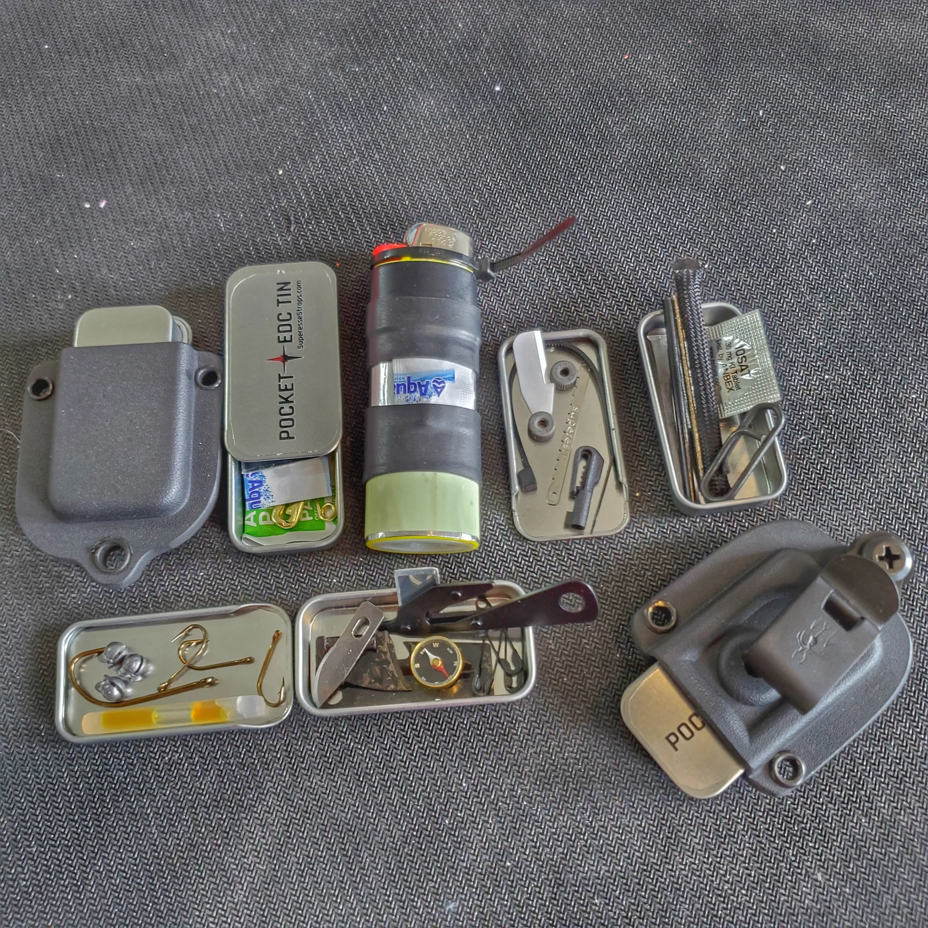 Survival Kit Lighter - Fire Starter outfitted with supplies.